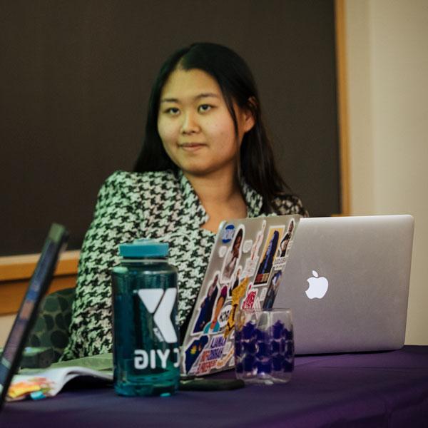 An Agnes Scott philosophy minor student looks ahead longingly in class.